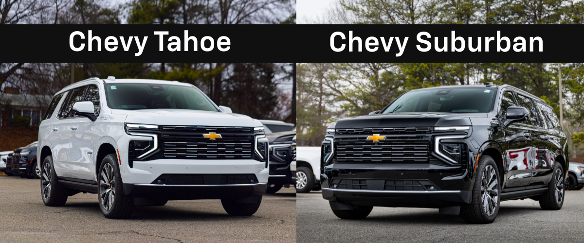 A white Chevy Tahoe next to a black Chevy Suburban. Both are parked in a dealership lot